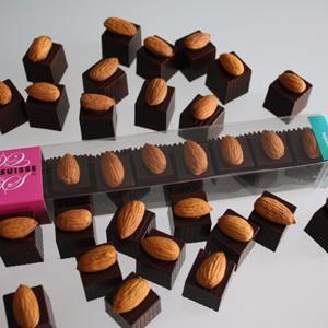 These gorgeous Coco Suisse Croquantine chocolates make for a perfect confectionery gift or personal indulgence. The triumphant combination of the finest hazelnut gianduja and croquantine crisp filling, surrounded by dark Swiss chocolate and topped with a roasted California almond, will delight your senses and satisfy your chocolate cravings.
