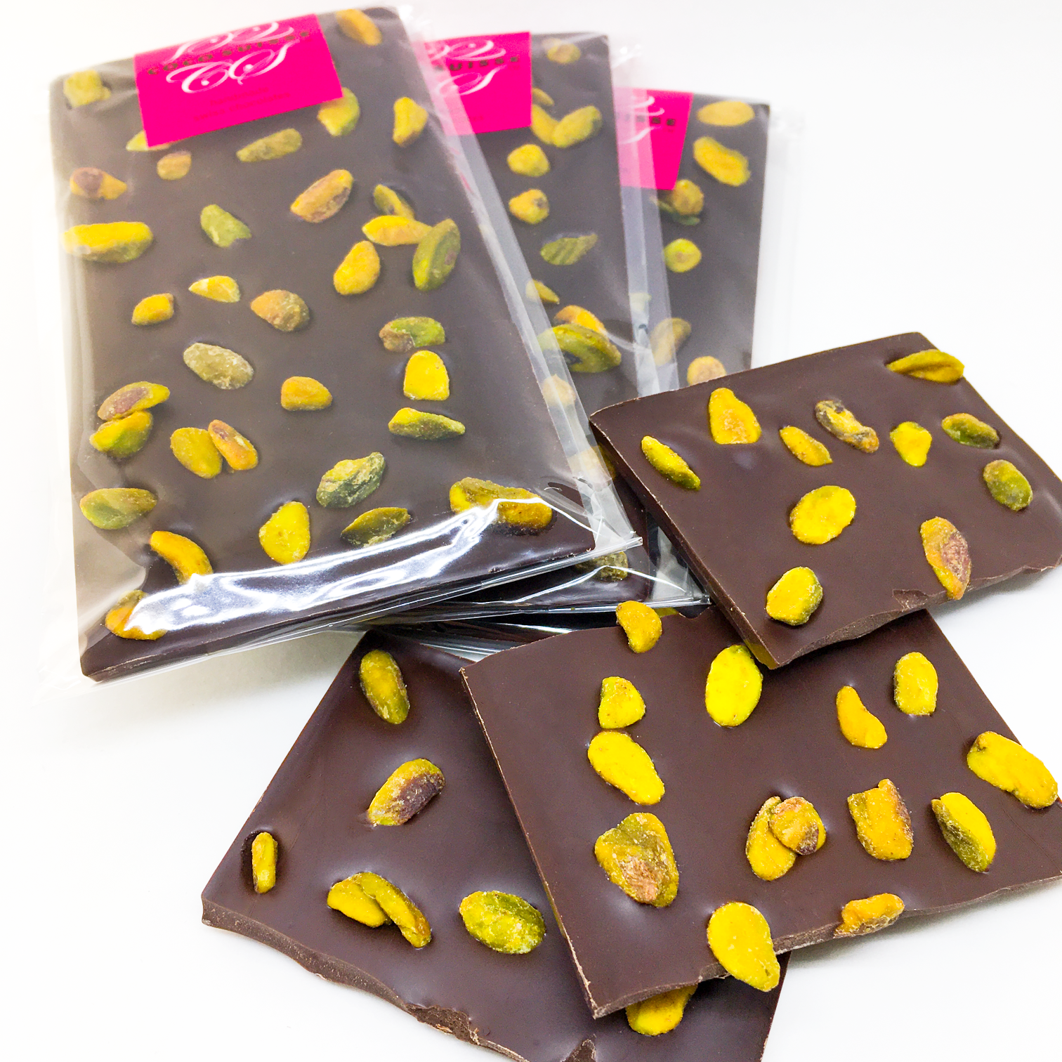 Pistachio Chocolate Bars  90 grams each. Total weight:  270 grams   Delicious and smooth dark Swiss 62% cocoa chocolate topped with nicely roasted and salted pistachios. Fantastic flavor combination will delight your palate and satisfy your chocolate desires.